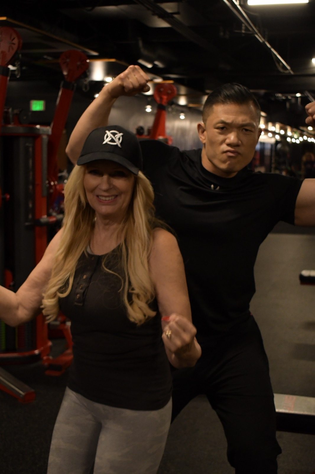 Post-PR biceps flex with coach